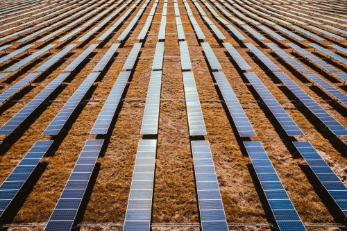 Aerial view of solar farm panels for renewable energy. - Australian Stock Image
