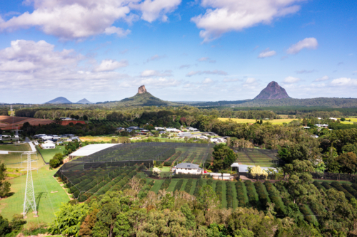 aerial view of Sunshine Coast region, with Glasshouse Mountains in the scene - Australian Stock Image