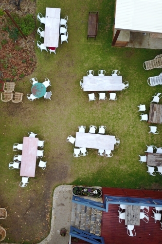 aerial view of tables and chairs on lawn