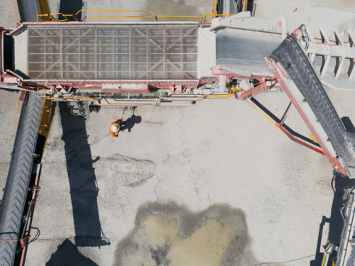 Aerial view of the quarry showing the conveyor belt and crusher. - Australian Stock Image