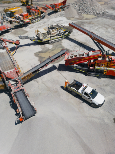 Aerial view of the quarry with machineries. - Australian Stock Image