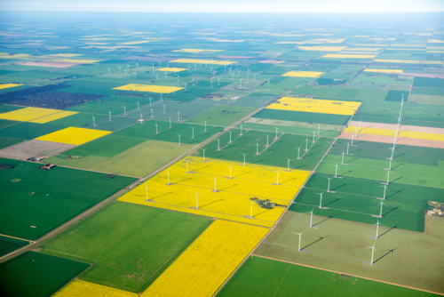 Aerial view of wind turbines and patchwork farmland - Australian Stock Image