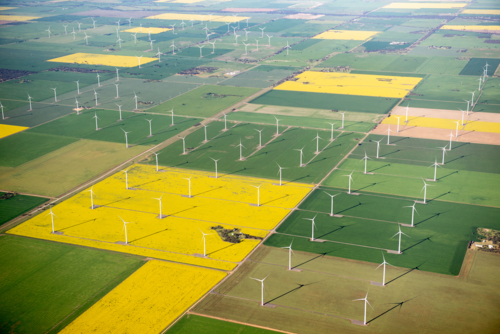 Aerial view of wind turbines and patchwork farmland - Australian Stock Image