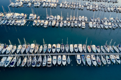 Aerial view of yachts moored in rows in a marina in Fremantle - Australian Stock Image
