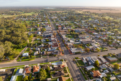 Aerial view over the main street and residential areas of a rural township - Australian Stock Image
