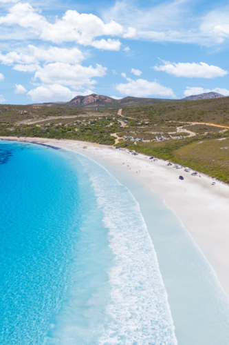 Aerial view over the stunning blue ocean and white sandy beach of Lucky Bay Esperance - Australian Stock Image