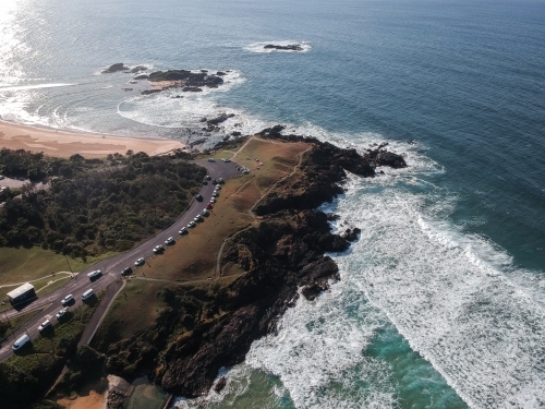Aerial view of waves rolling in at Sawtell Beach