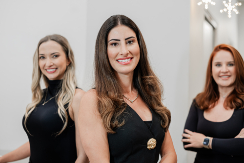 Aesthetic practitioners standing along the corridors in skin and laser clinic - Australian Stock Image