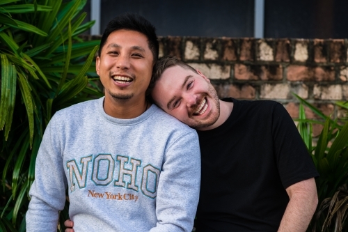 affectionate moment, gay couple - Australian Stock Image