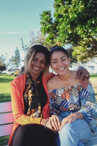 African mother and multicultural teen daughter