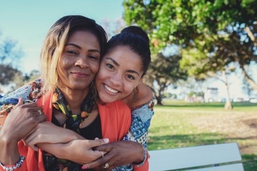 African mother and multicultural teen daughter - Australian Stock Image