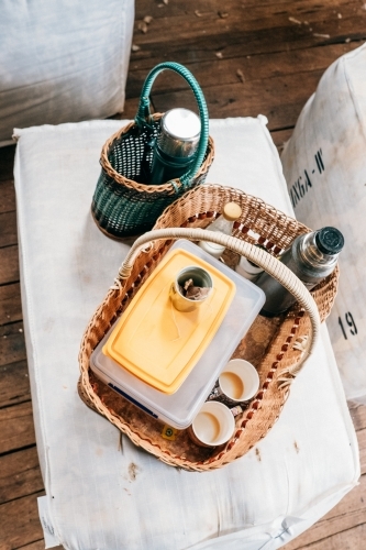 Afternoon tea basket on a wool bale table at shearing time. - Australian Stock Image