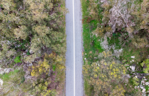 An aerial shot of a country road - Australian Stock Image