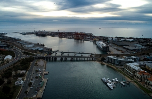 An aerial view of a water inlet and the surrounding port