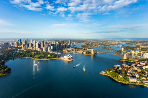 An aerial view over Sydney Harbour taken in the early morning - Australian Stock Image