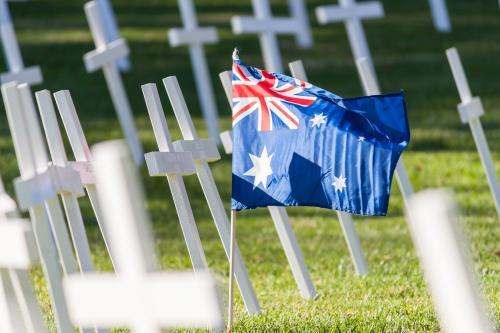 An Australian flag amongst a group of crosses - Australian Stock Image