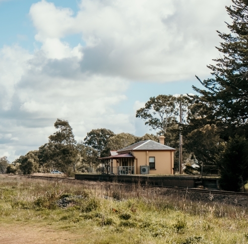 An empty train station on a sunny day - Australian Stock Image