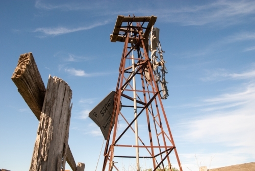 An old broken windmill on a farm in the country - Australian Stock Image