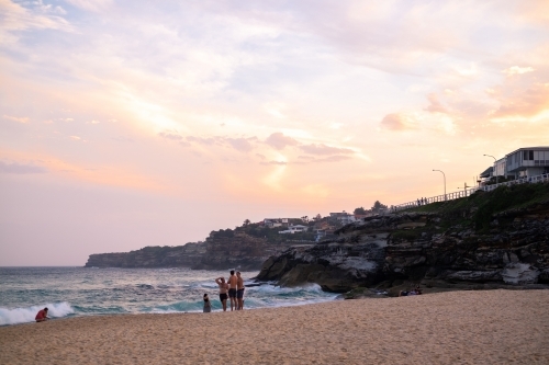 an orange sunset at Tamarama beach - Australian Stock Image