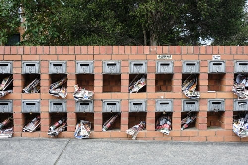Apartment letterboxes containing junk mail - Australian Stock Image
