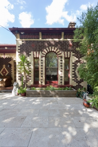 Arched window feature in Victorian era Australian home in Melbourne - Australian Stock Image