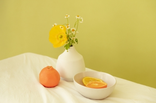 Artistic Styling of Display Of Fruit Flowers and Vase - Australian Stock Image