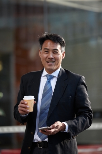 Asian businessman in city