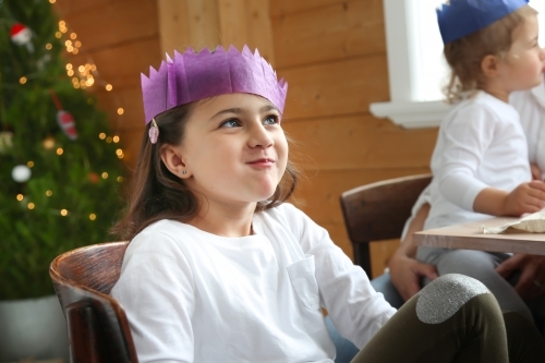 Girl smiling in Christmas hat - Australian Stock Image