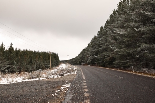 Australian country roads during snowy winter season at Shooters Hill, NSW Australia - Australian Stock Image