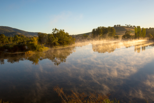 Australian landscape and misty lake on a cold morning in Allans Flat, near Yackandandah - Australian Stock Image