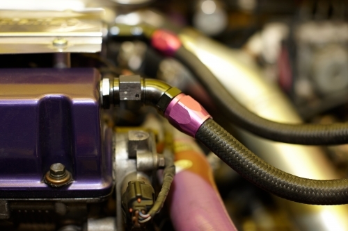 Automotive work on engine of vehicle - Australian Stock Image