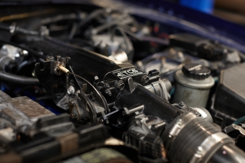 Automotive work on engine of vehicle - Australian Stock Image
