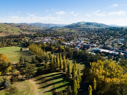 Autumn trees lining road in Gundagai NSW - Australian Stock Image
