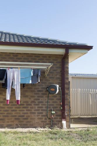 Backyard Washing Line Filled with Clothes