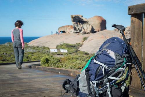 bag of Woman hiking Kangaroo Island Wilderness Trail - Australian Stock Image