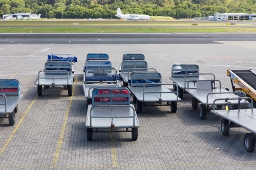Baggage handling trolleys at an airport