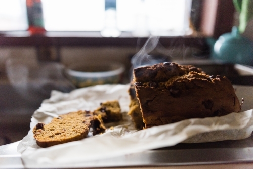 Banana bread cooling on bench - Australian Stock Image