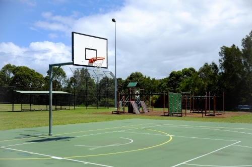 Basketball Court with Kids Playground - Australian Stock Image