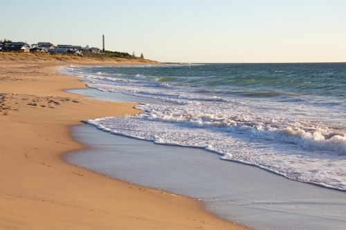 beach at Bunbury looking towards lighthouse - Australian Stock Image