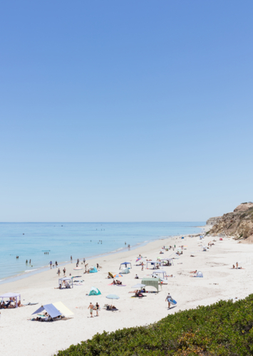 Beach on a clear day with no waves - Australian Stock Image