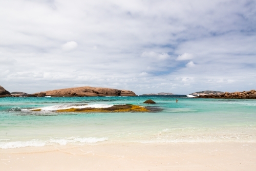 Beach with turquoise and rocky islands - Australian Stock Image