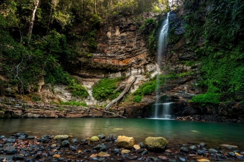 Beautiful Clover Falls and it's stony waterhole pool - Australian Stock Image