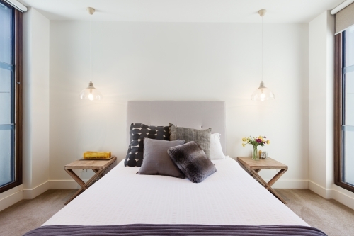 Beautiful hamptons style bedroom decor in luxury home interior - Australian Stock Image