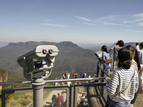 binoculars and tourists at Echo point lookout - Australian Stock Image