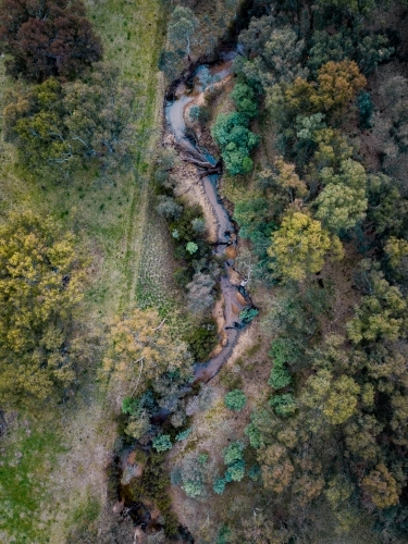 Birds eye view of small creek - Australian Stock Image