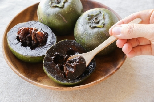 Black sapote chocolate pudding fruit - Australian Stock Image