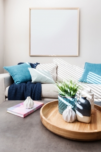 Blank square picture mock up in contemporary living room - Australian Stock Image