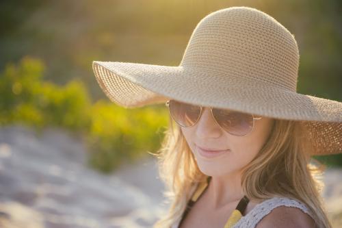 Blonde Girl on the Beach at Sunset - Australian Stock Image