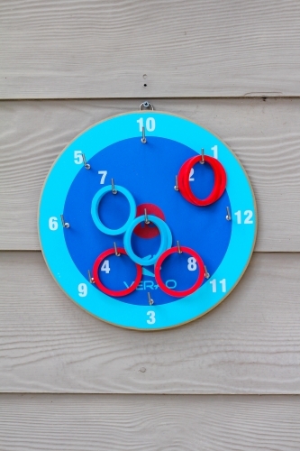 Blue hookey board on wall - Australian Stock Image