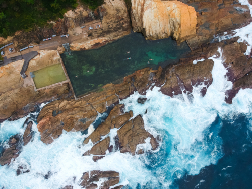 Blue pool and ocean at Bermagui from above - Australian Stock Image